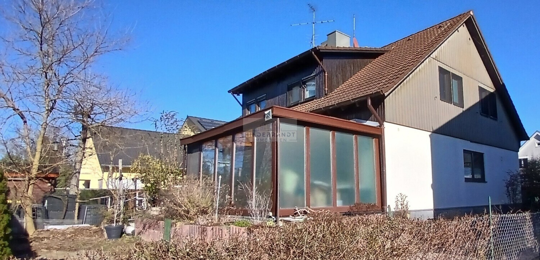Westseite mit Wintergarten