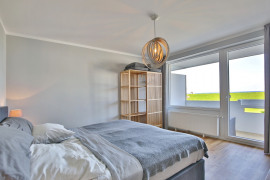 Schlafzimmer mit Balkonzugang