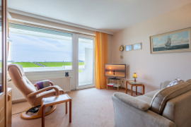 Wohnbereich mit Sofa und Relaxsessel
