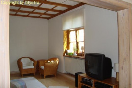 Blick von Esszimmer ins Wohnzimmer mit abgehangener Decke (2,50m)