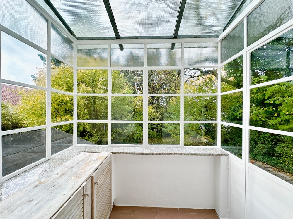 Charmante Erdgeschosswohnung mit kleinem Wintergarten und eigenem Gartenteil - Foto 2