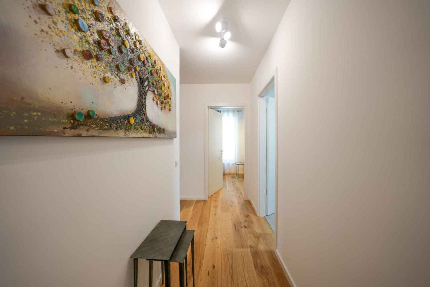 Traumhafte Neubauwohnung im Souterrain mit großem eigenen Garten - Photo 1