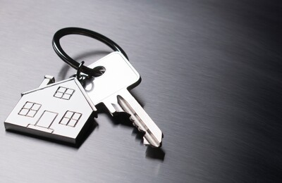 Schlüssel mit Haus-Anhänger