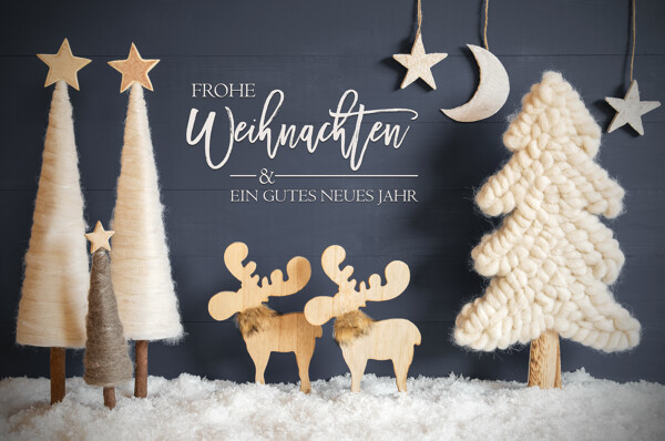 Weihnachtsdeko mit Weihnachts- und Neujahrswünschen