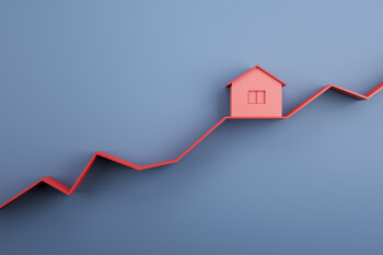 Steigender Graph mit Modellhaus