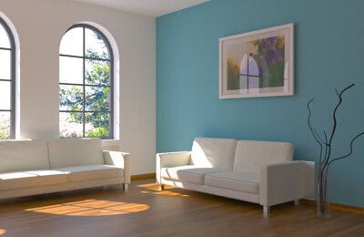 Sofa vor türkiser Wand