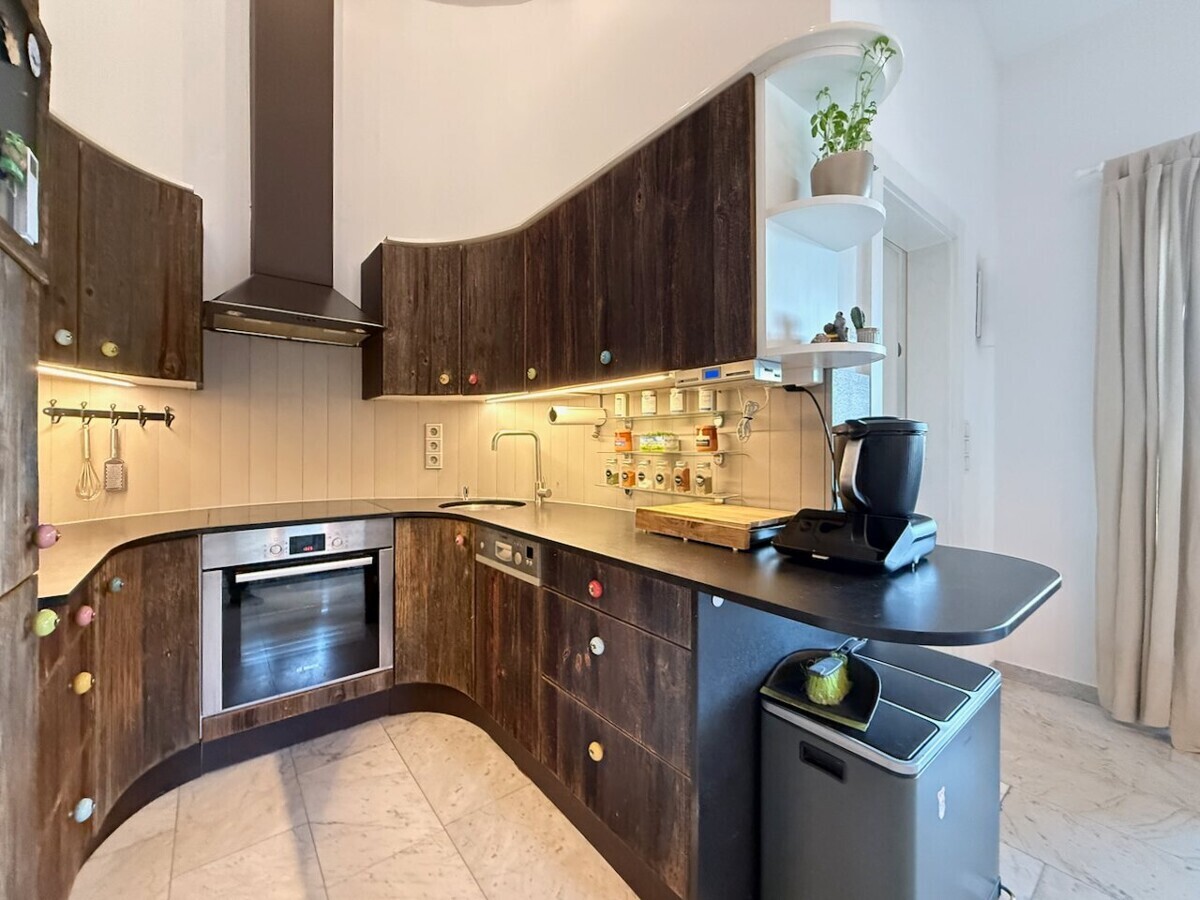 Rustikale Einbauküche mit Holzfronten