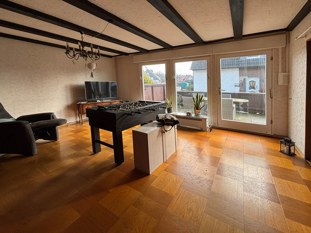 Wohnzimmer und Ausgang zur Terrasse