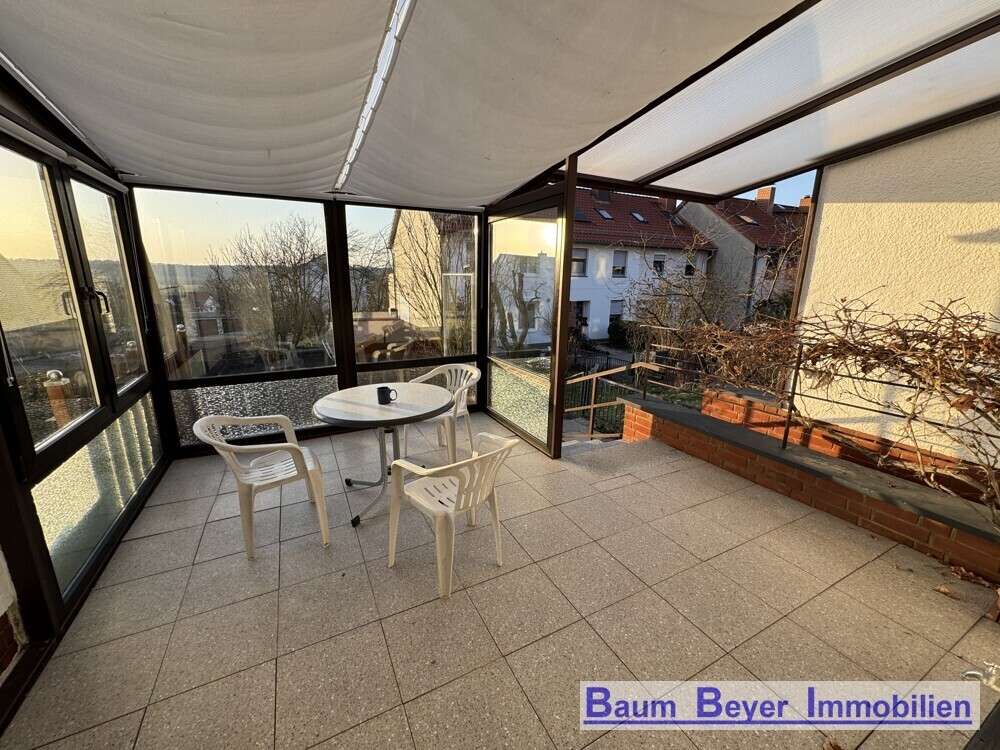Terrasse mit offenem Wintergarten