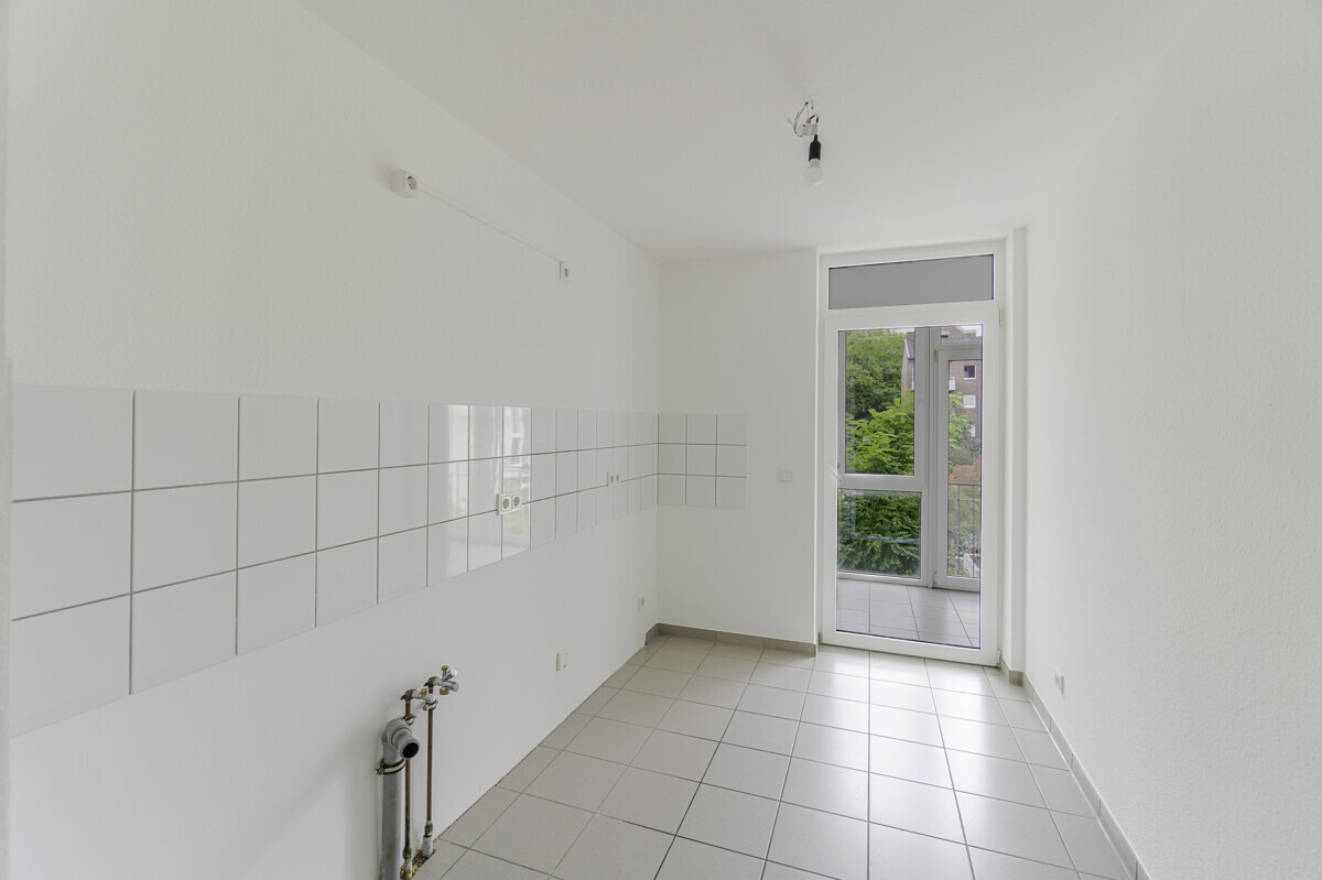 Separate Küche mit Platz für einen gemütlichen Frühstücksbereich