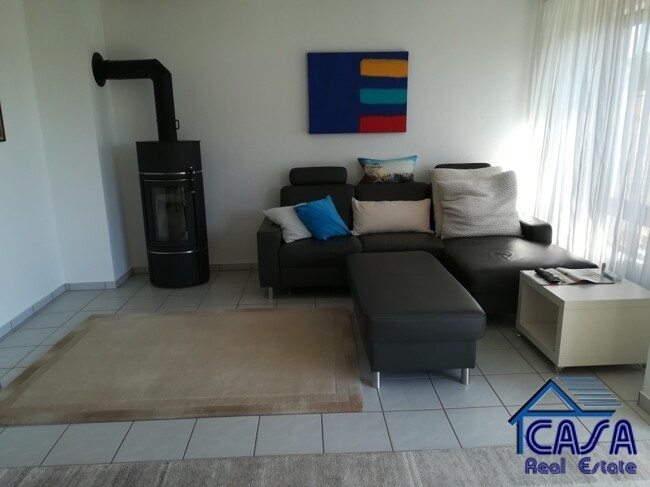 Wohnzimmer mit Kamin