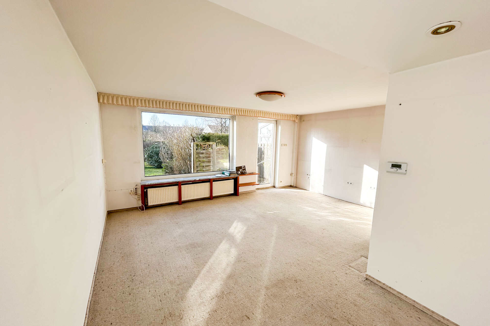 Wohn-/Esszimmer mit Terrassenzugang EG