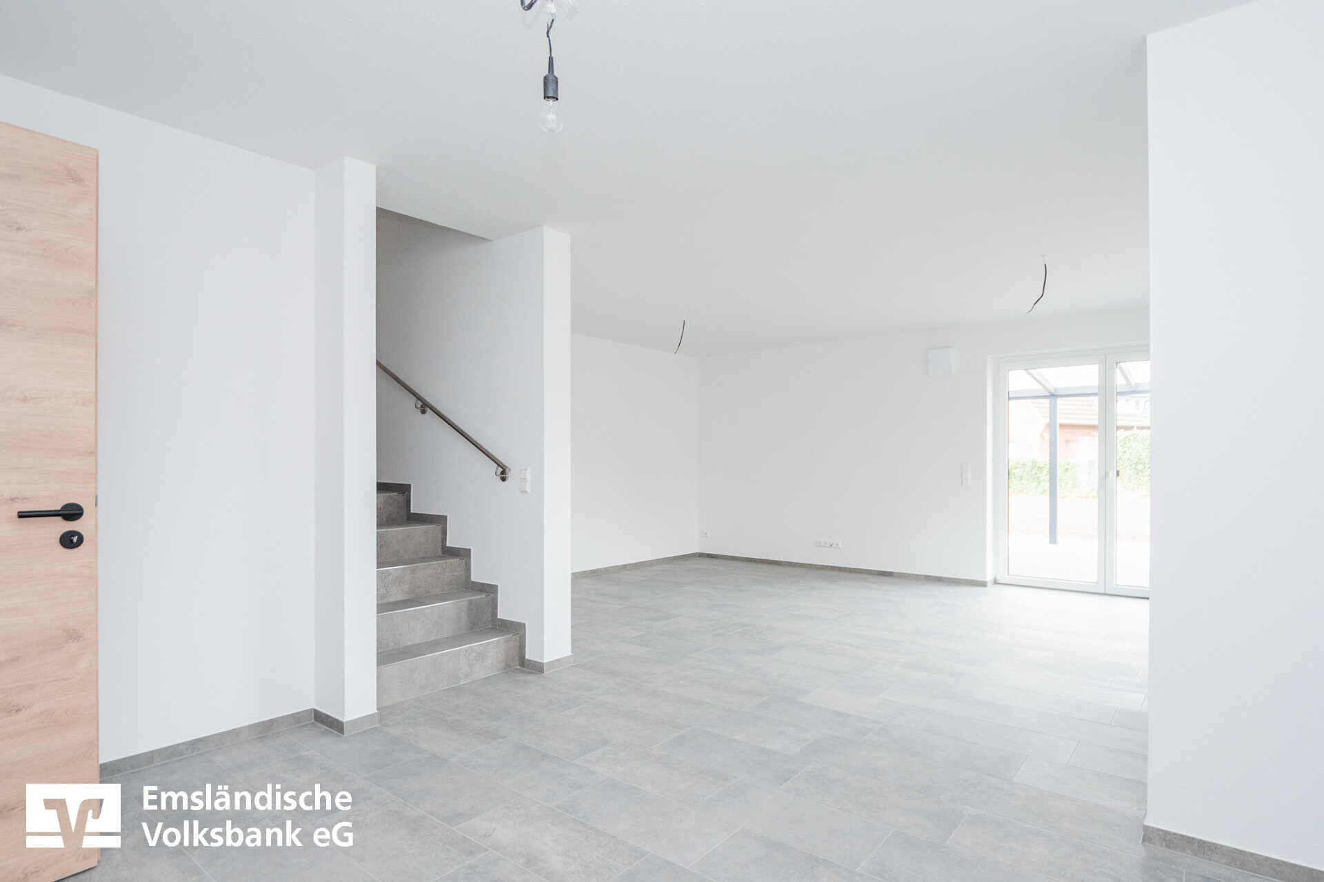 Wohn- und Esszimmer mit offener Küche