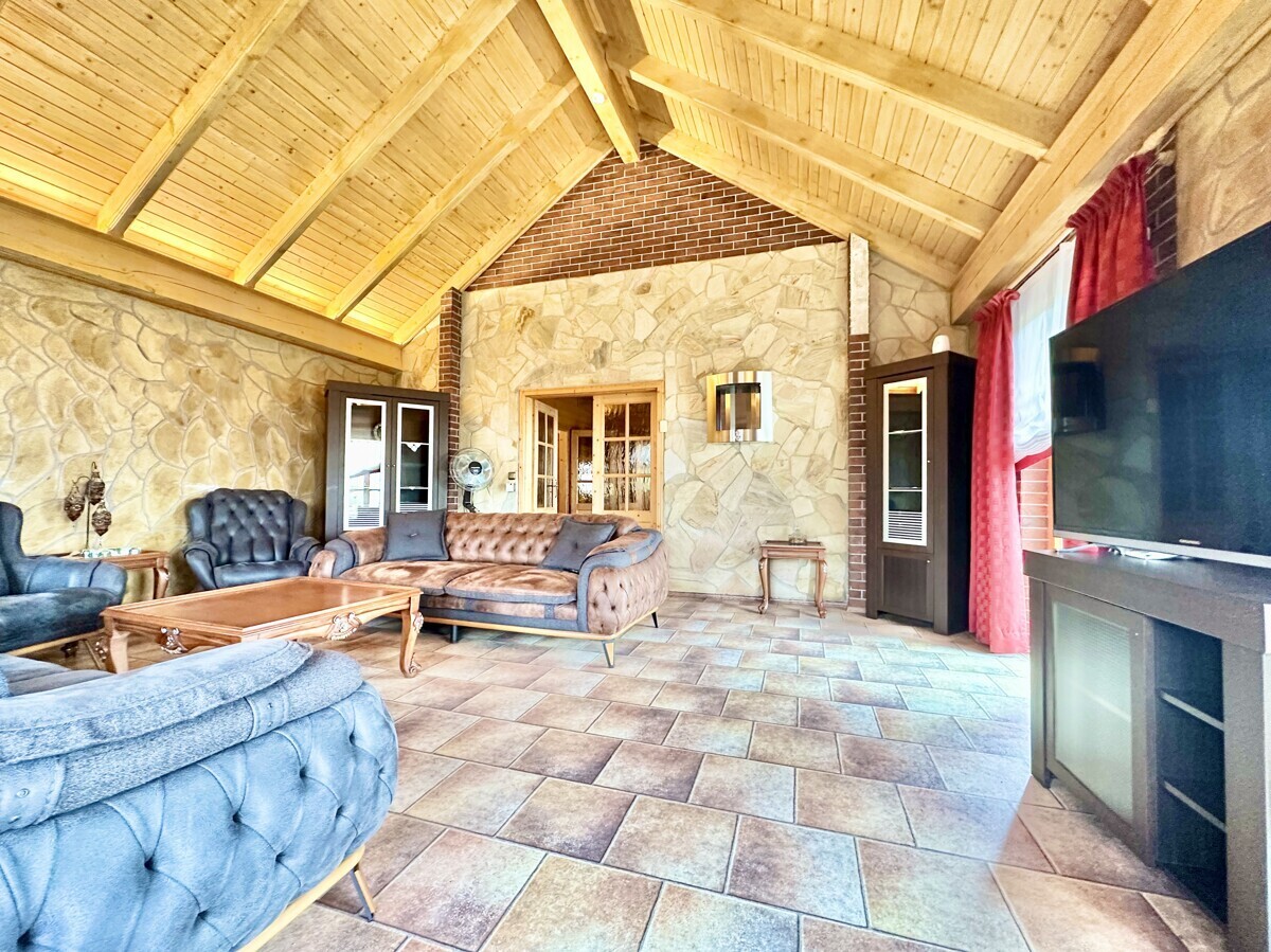 Wohnzimmer mit Gartenzugang EG 