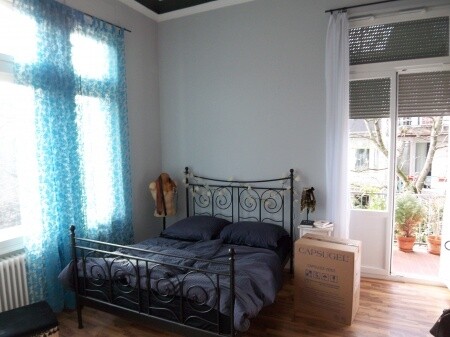 Schlafzimmer mit Balkon