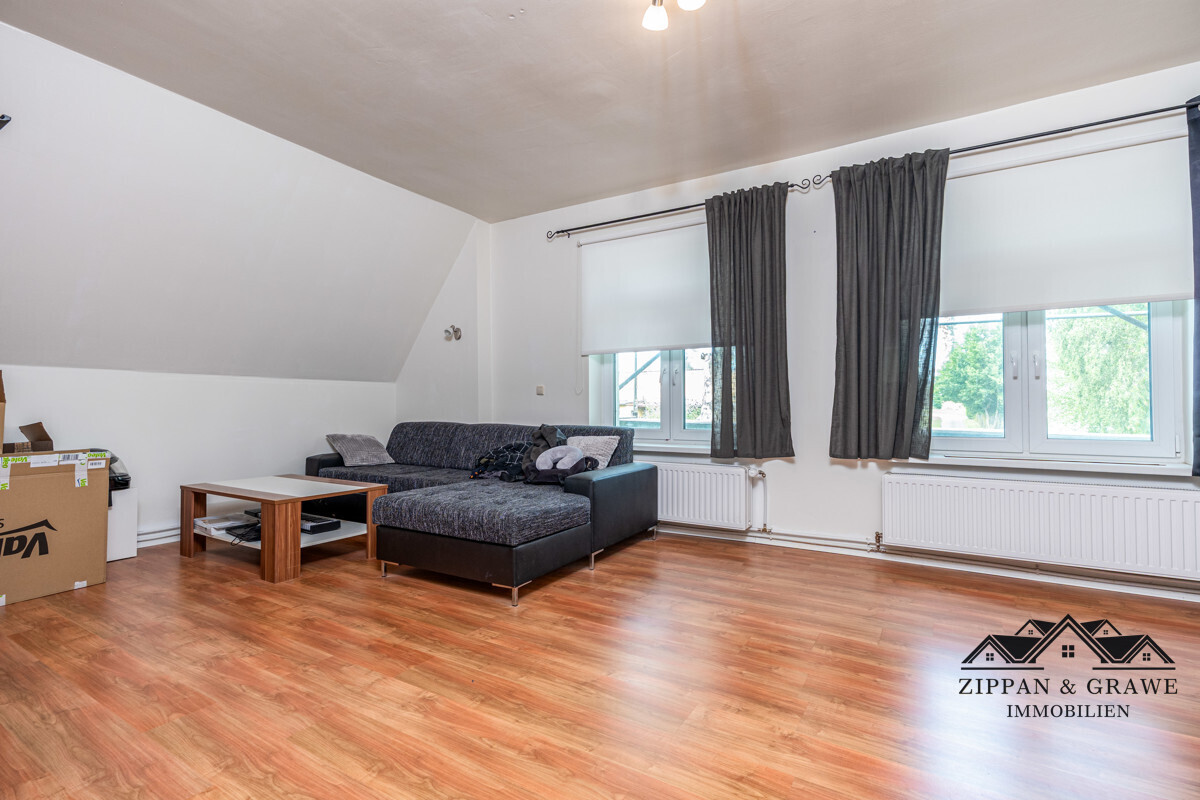 Wohnzimmer Wohnung 4 DG