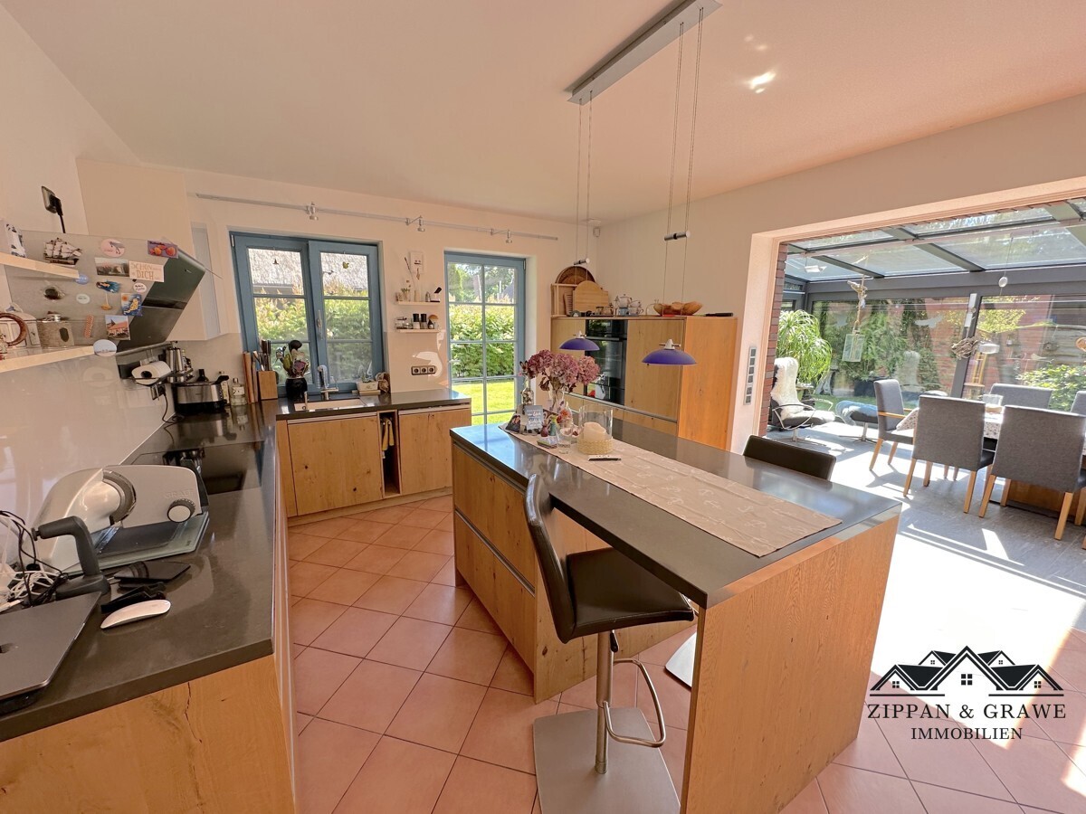 Wohnzimmer/Küche/Wintergarten