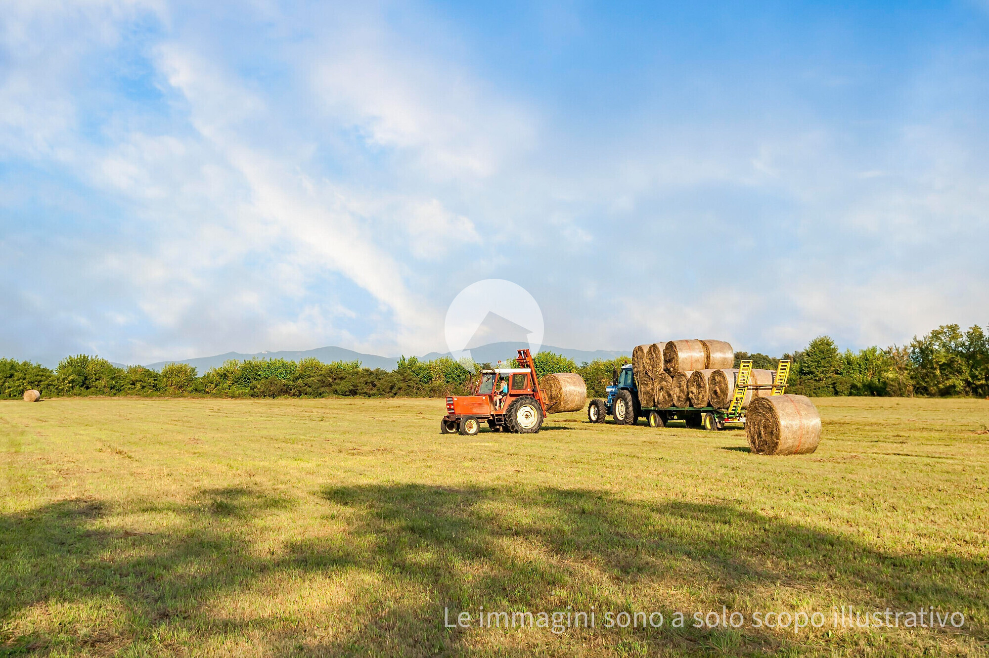 agricultural-scene-tractor-lifting-hay-bale-on-ba-2025-01-09-12-38-27-utc