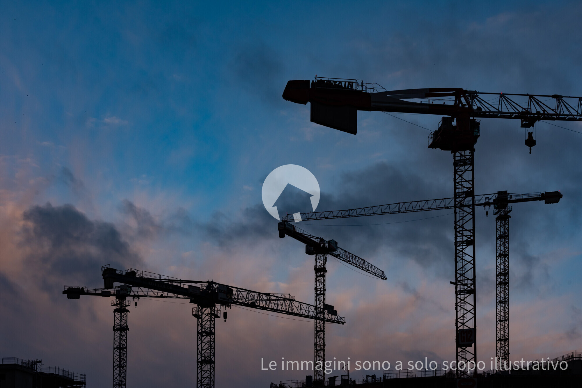 tower-cranes-silhouettes-against-the-cloudy-sky-m-2025-02-02-14-42-44-utc