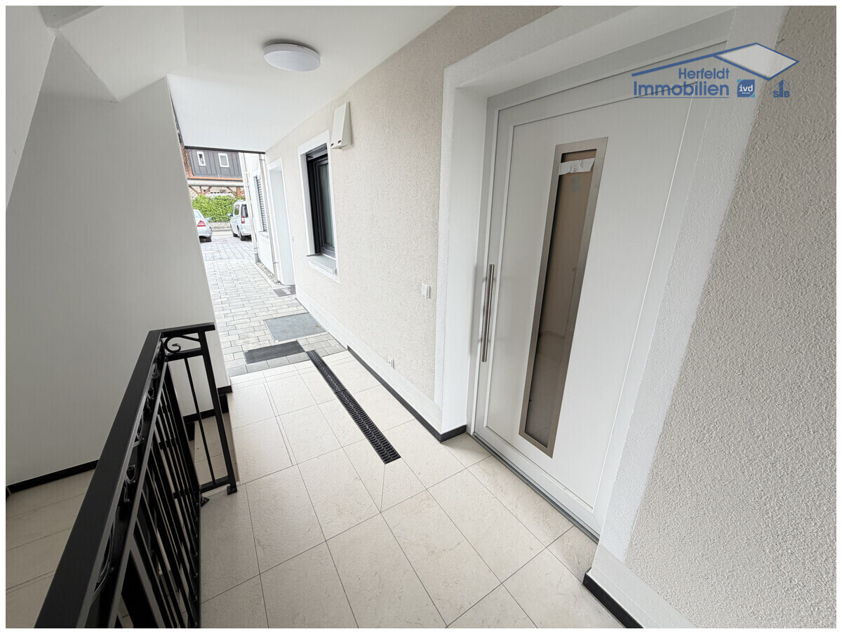Überdachter Eingangsbereich zur Wohnung