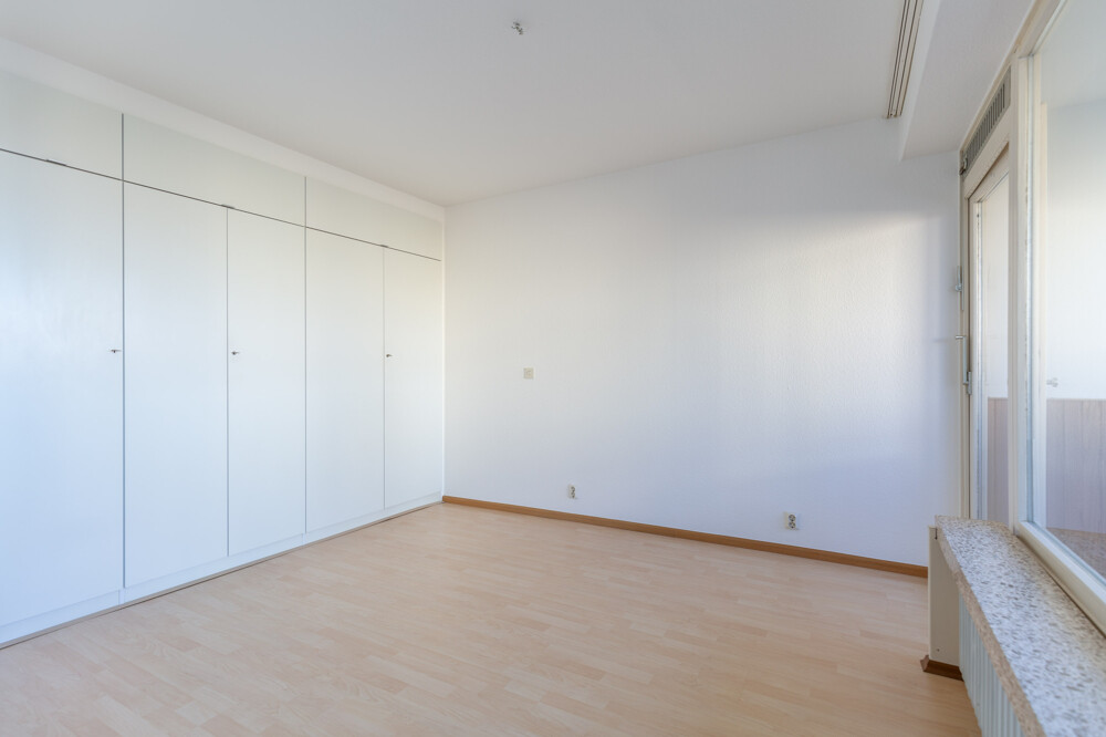 Schlafzimmer mit Balkonzugang