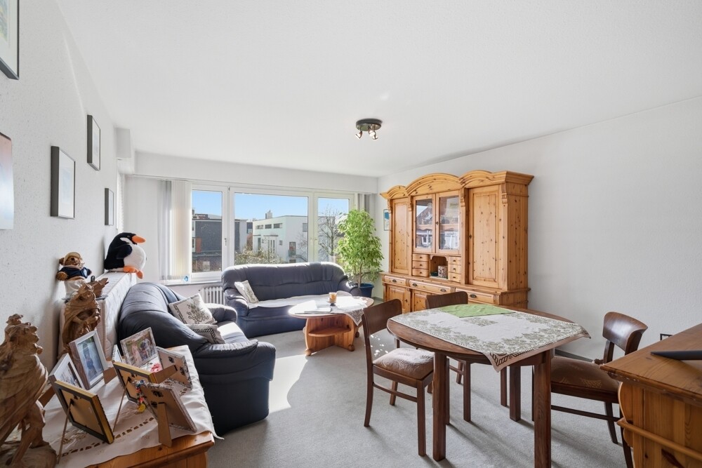 OG - Wohn- und Essbereich mit Zugang zum Balkon