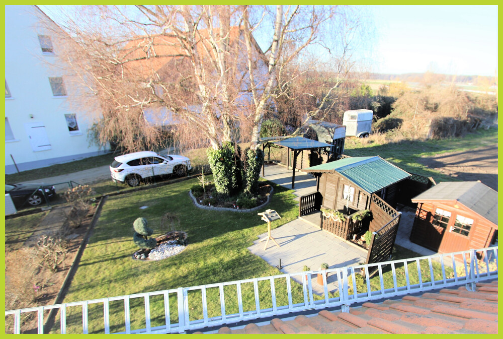 Blick aus Bad und Küche auf Ihren Garten