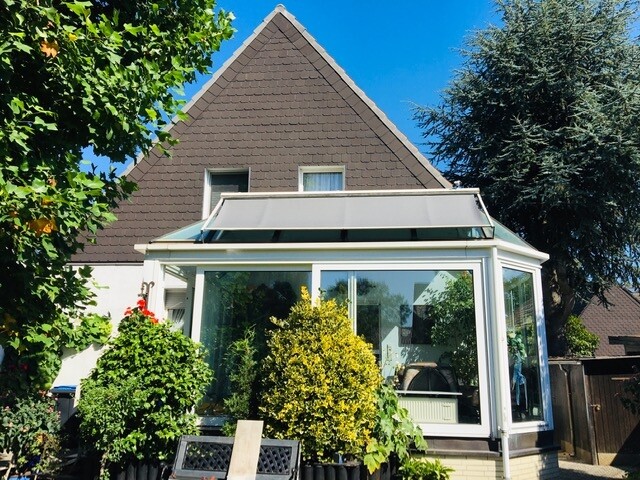 Rückansicht mit Wintergarten