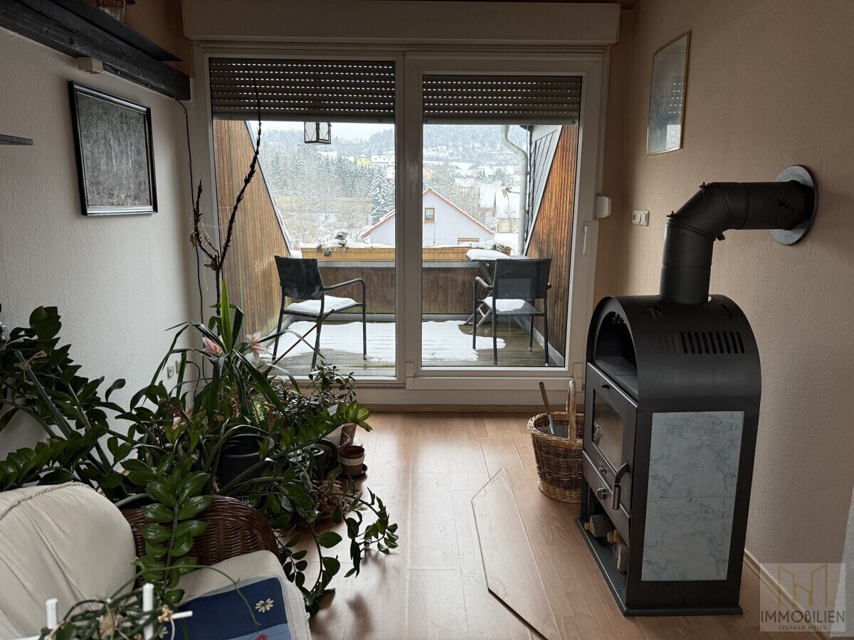 Wohnung DG: Wohnzimmer mit Dachterrasse