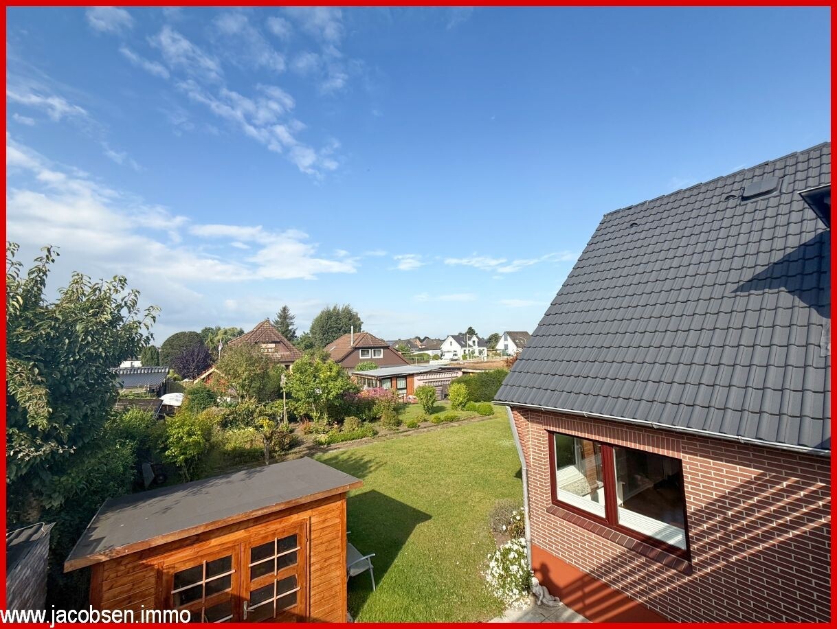 Ausblick von der Dachterrasse in den Garten