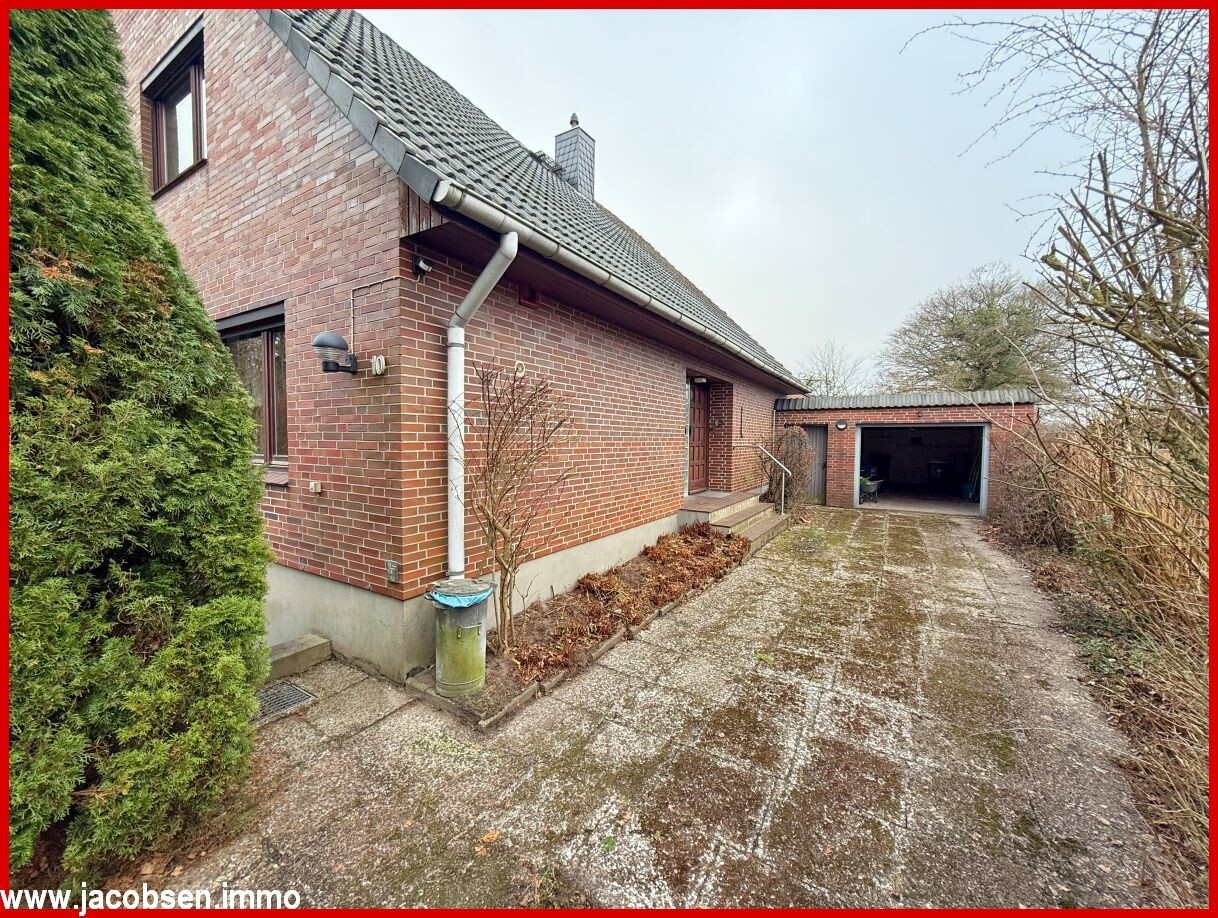 Auffahrt mit Garage