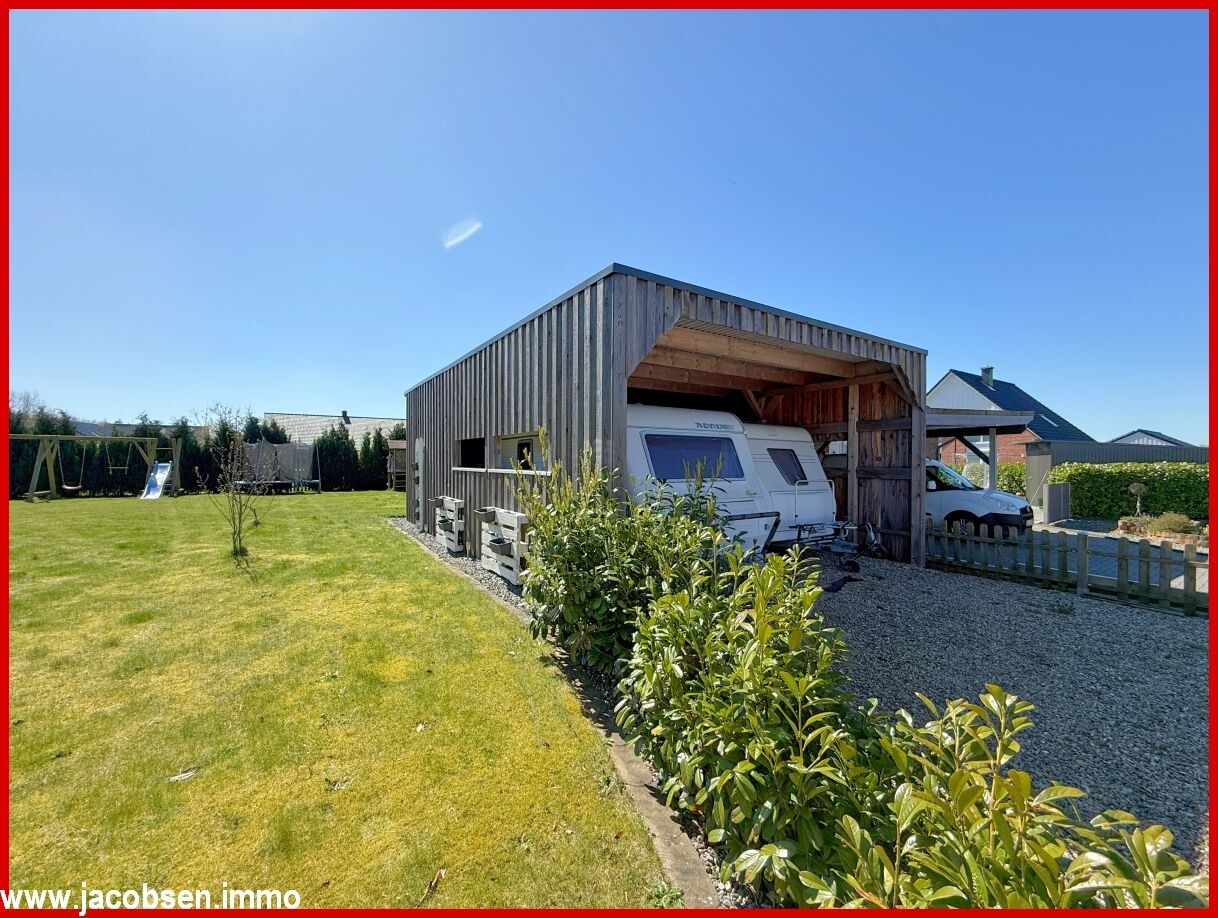 Doppelcarport an der Nordwestlichen Grundstücksecke