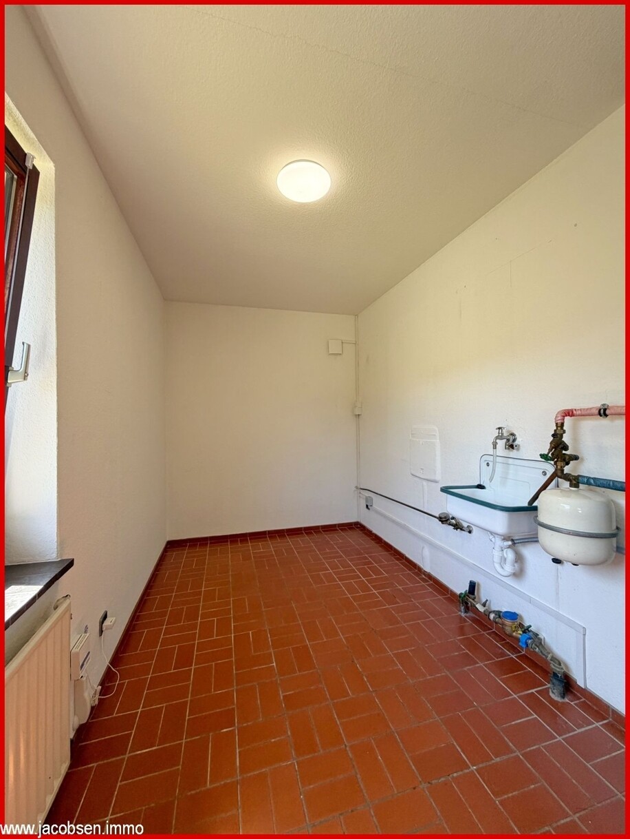 Hauswirtschaftsraum mit Heizungsanlage