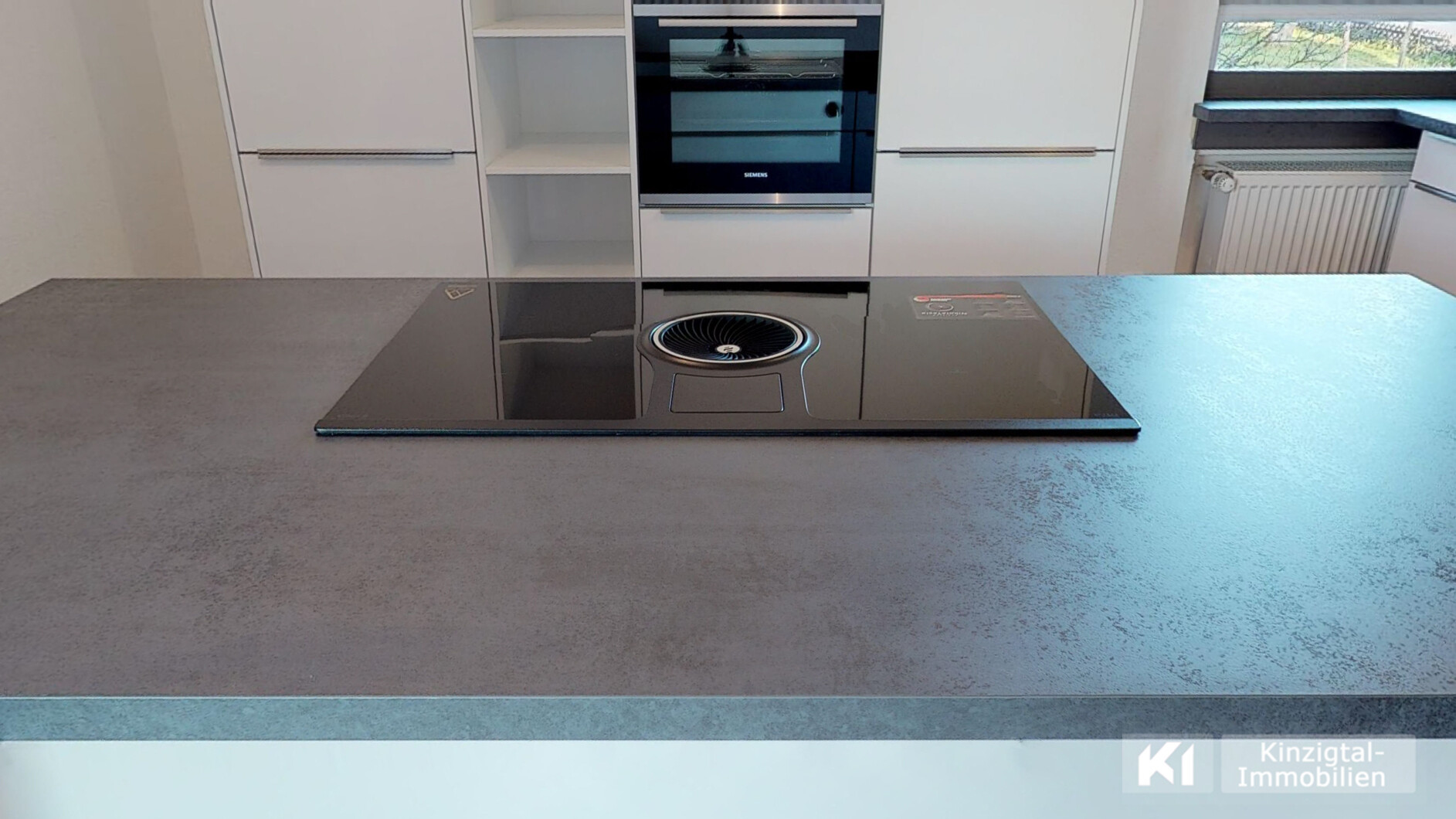 ... Induktionsfeld mit Abzug