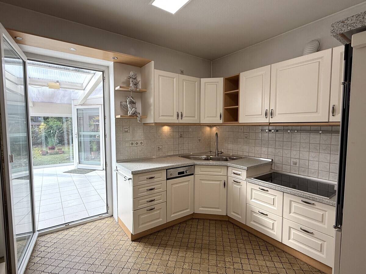 ...mit Zugang zum Wintergarten