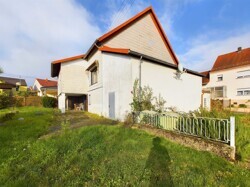 Einfamilienhaus mit Baugrundstück in Nalbach-Piesbach