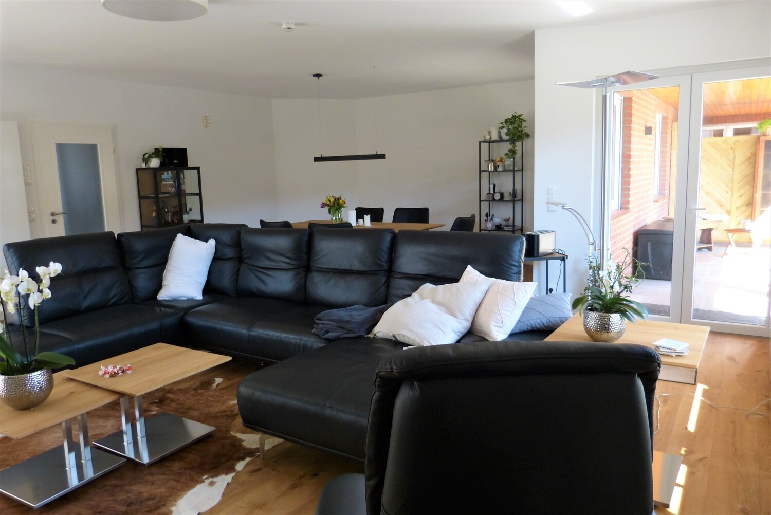 Wohnbereich mit Zugang auf die Südterrasse