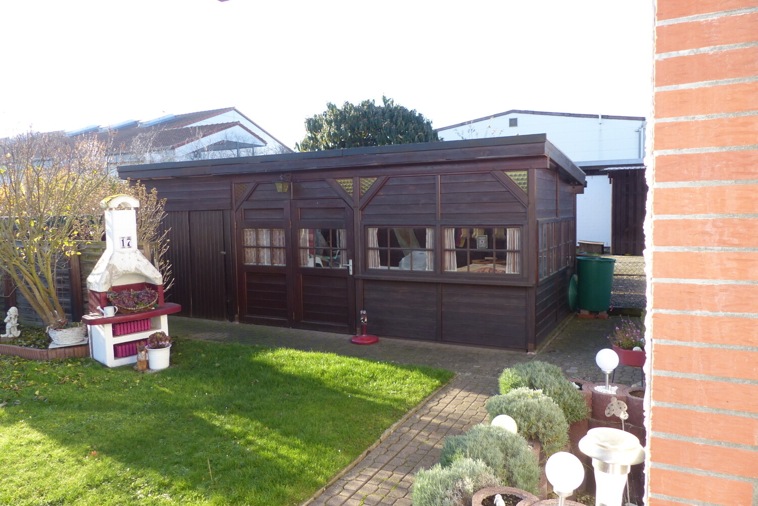 Gartenlaube und Schuppen