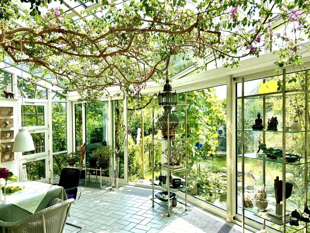 Das Herzstück: Beheizter Wintergarten mit zweifacherSchiebetür
