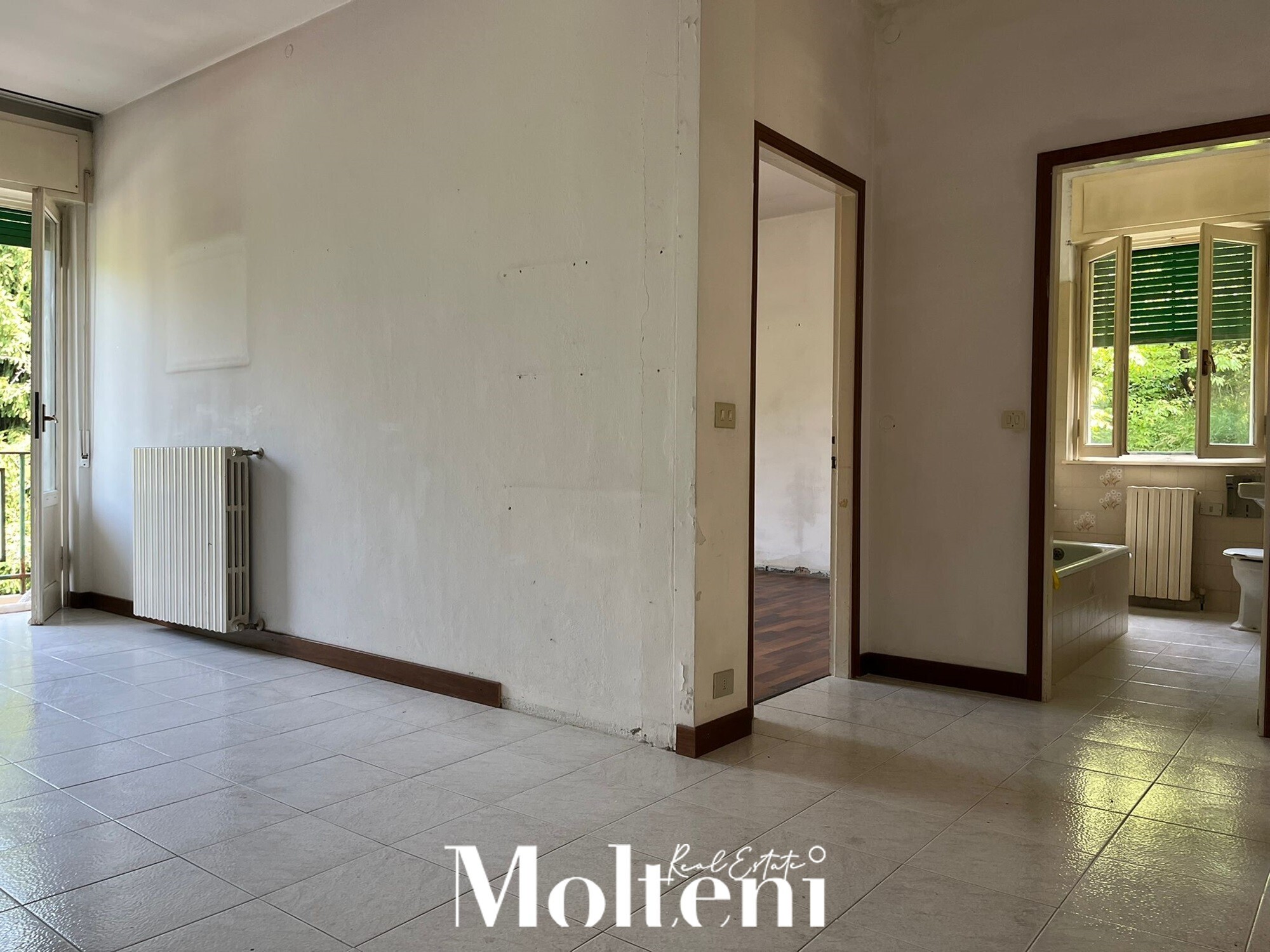 molteni-real-estate-carenno-appartamento-apartments-vendesi-for-sale-garage (12)
