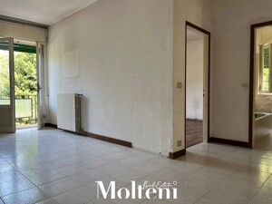 molteni-real-estate-carenno-appartamento-apartments-vendesi-for-sale-garage (11)