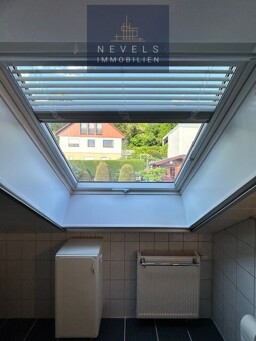 Dachfenster mit Velux Rollo
