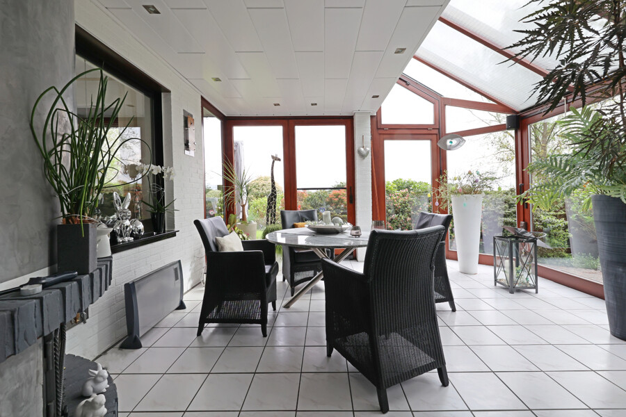 Wintergarten mit Kamin