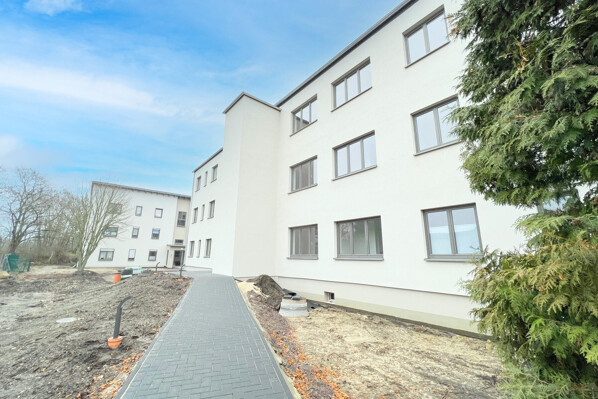 gepflasterte Zuwegung