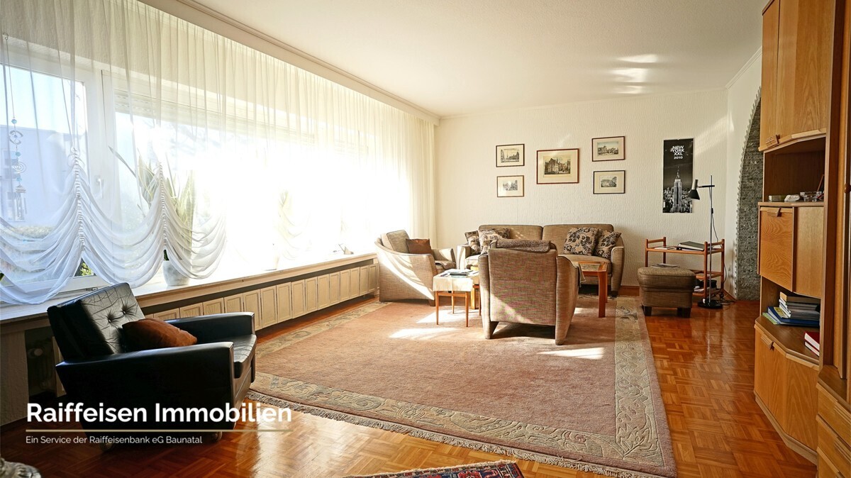 RAIBA IMMO - Wohnen am Sonnenhang 1 - Wohnzimmer