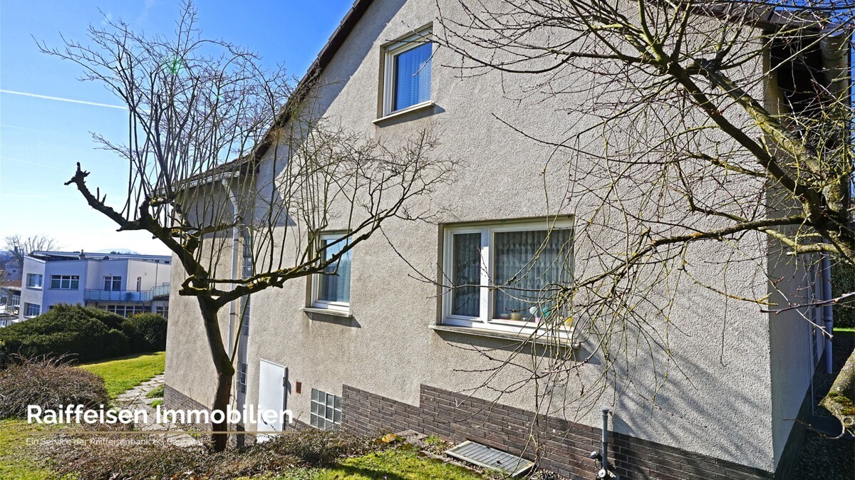 RAIBA IMMO - Wohnen am Sonnenhang 1 - Hausansicht Seite