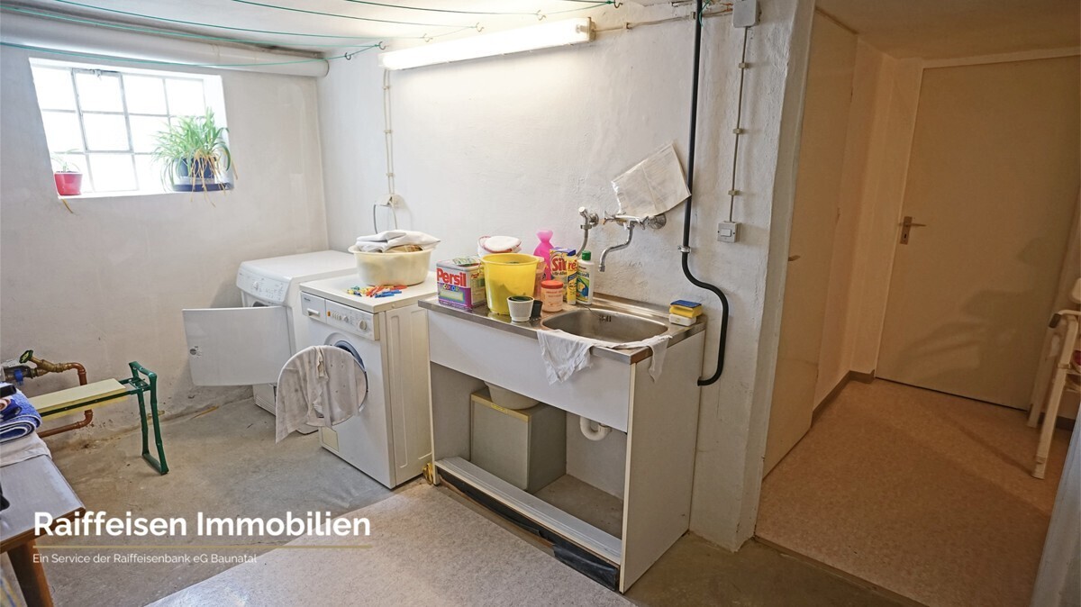 RAIBA IMMO - Wohnen am Sonnenhang 1 - Waschküche UG
