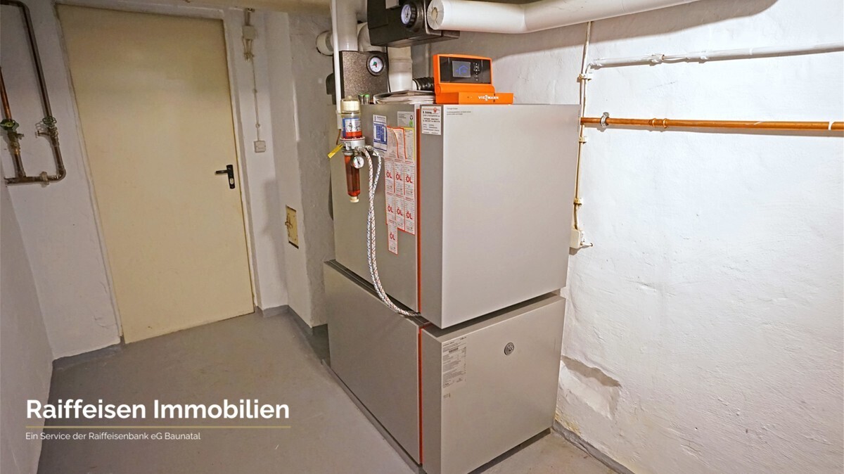 RAIBA IMMO - Wohnen am Sonnenhang 1 - Heizung UG