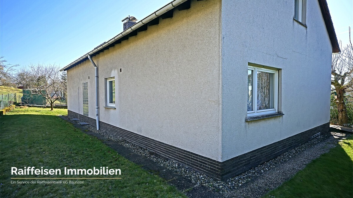 RAIBA IMMO - Wohnen am Sonnenhang 1 - Hausansicht von hinten