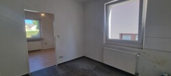 Küche und ein weiteres Zimmer